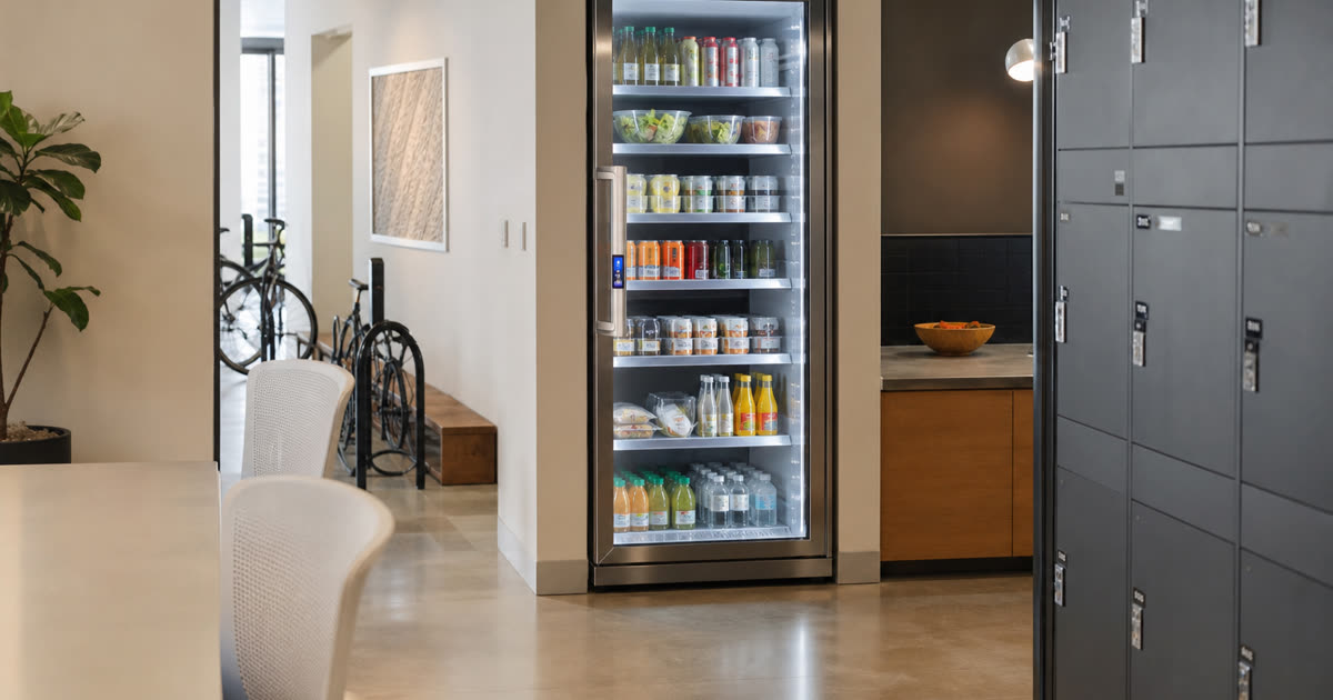 Revvolto smart fridge near an Austin workplace commuter area with stocked food and clear service access