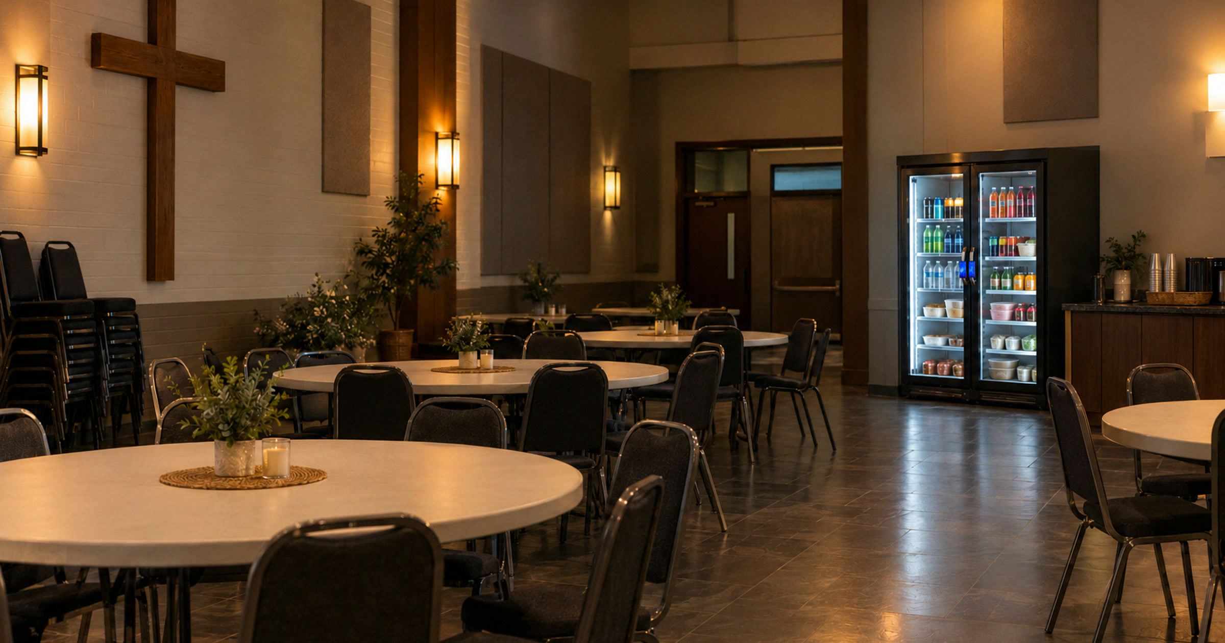 Revvolto smart fridge in a church fellowship hall prepared for an evening community gathering